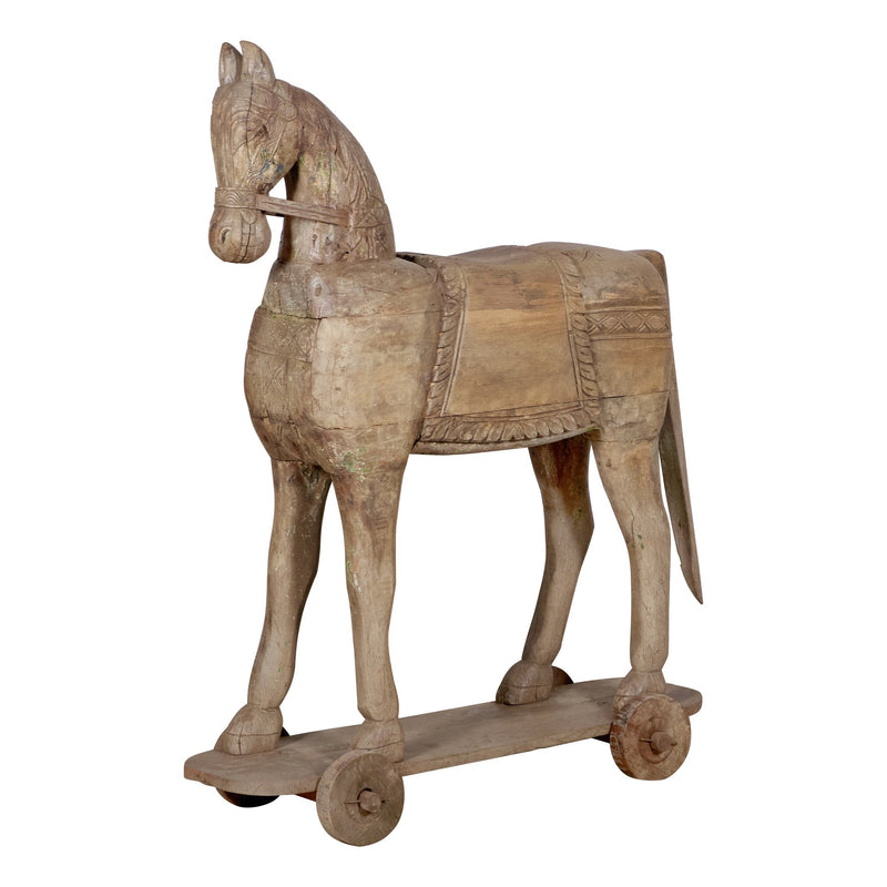 Carved Wooden Horse on Wheels by Studio Vastu