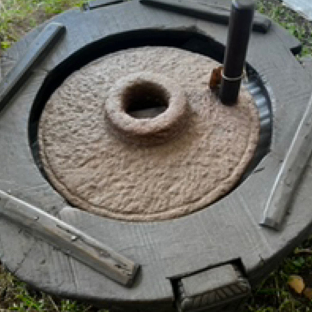 Hand-Carved Stone Grinder Table by Studio Vastu