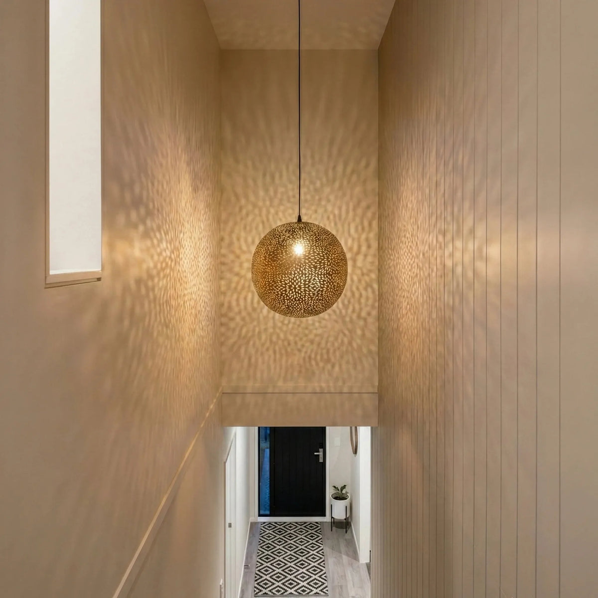 Perforated Brass-Finish Steel Orb Pendant by Studio Vastu